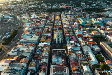 Downtown Martinique Fort-de-France urban grid from above with historic church