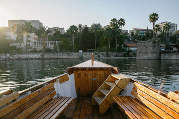 The prow of the boat faces the view of the old city of Tiberias on the Sea of ​​Galilee,The prow of the boat faces the view of the old city of Tiberias on the Sea of ​​Galilee, The Ancient Galilee Boa
