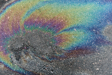 Asphalt background gasoline pollution road stain iridescent