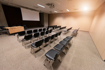 Empty chairs in large Conference hall for Corporate Convention or business summit