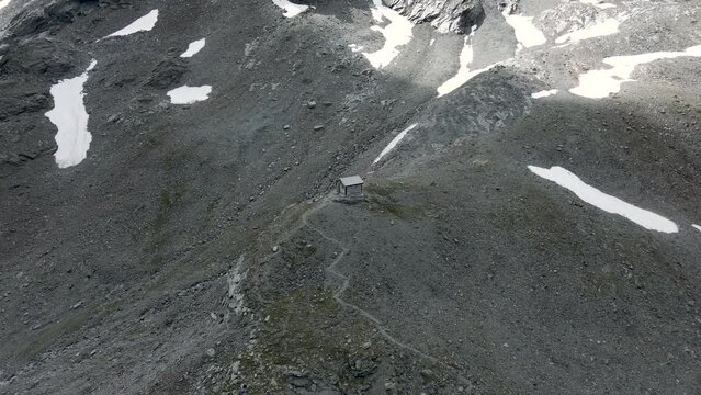 Drone aerial approaching of Bivacco Cecchini Val Loga Italian Alps
