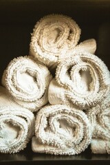 Vertical shot of rolled face towels