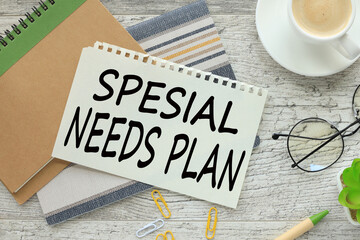 top view of pen, pencil, cup of coffee and notepad with text special needs plan