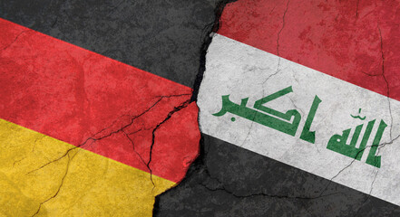 Germany and Iraq flags, concrete wall texture with cracks, grunge background, military conflict concept