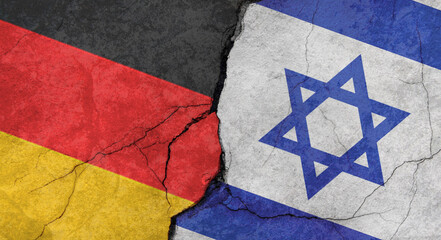 Germany and Israel flags, concrete wall texture with cracks, grunge background, military conflict concept