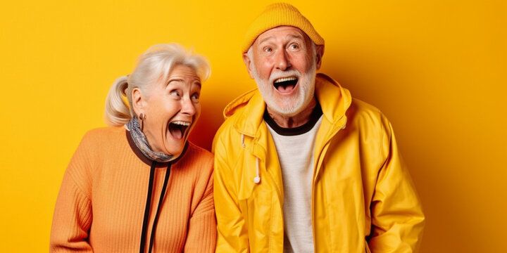 Joyfully Eccentric Elderly Couple Embraces the Sunshine in Bold Yellow Attire Against a Radiant Yellow Backdrop, AI generated