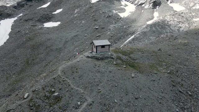 Drone aerial approaching of Bivacco Cecchini Val Loga Italian Alps