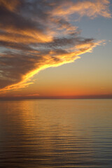 orange cloudy sunset sky view from the sea