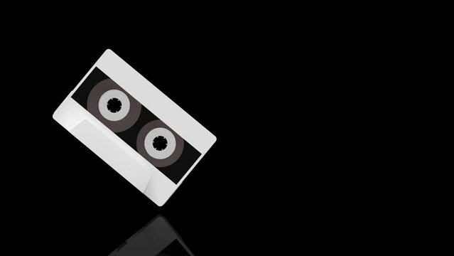 White Cassette Tape turns on itself - loop animation - black background