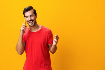 Man smartphone phone space happy mobile phone copy cyberspace communication yellow smiling technology portrait studio