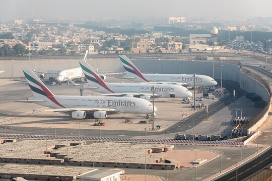 Dubai, United Arab Emirates - October 11, 2023: Emirates planes in the Dubai International Airport