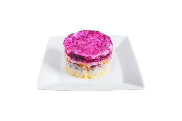 Layered salad with herring, beets, carrots, onions, potatoes on a plate isolated on white