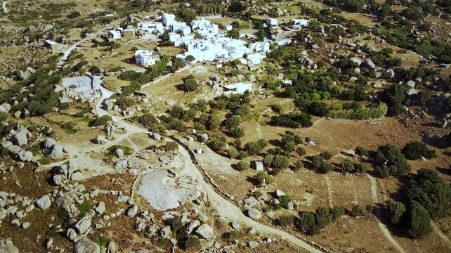 Drone footage of the mountain village of Volax on the Volax Plateau on a sunny day in Tinos, Greece