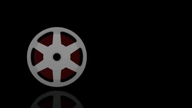Film Tape Reel turns on itself - loop animation - black background