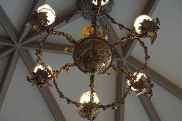 Nice chandelier hanging from a ceiling