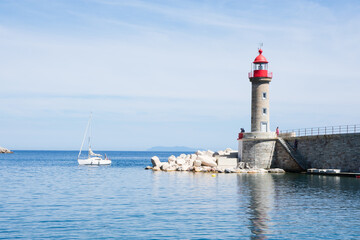 Fototapeta na wymiar Lighthouse on the coast of Bastia, Corsica
