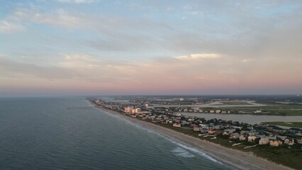 Aerial view of the sea beach under a blue sky