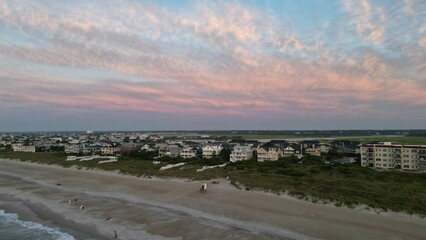 Aerial view of the sea beach under a blue sky