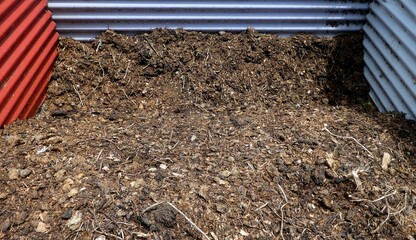 Composting mixture of decomposing garden plants and food scraps