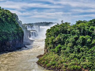 Iguazu Falls, the largest series of waterfalls of the world, located at the Brazilian and...
