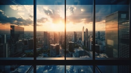 Sunrise or sunset with the city,View through glass windows for take aerial view of buildings in the city - obrazy, fototapety, plakaty