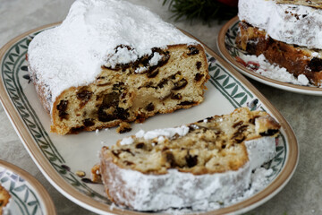 Stollen cake with candied fruits and marzipan.