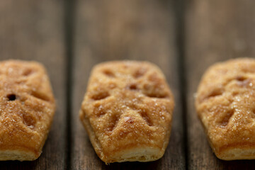 Biscuit cookies with filling. Italian snack (Bocconcini alla crema di nocciola). Close-up view.