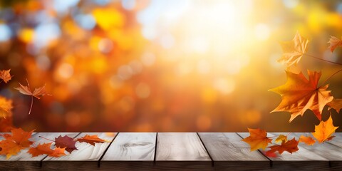 Naklejka na ściany i meble Wooden Table With Orange Leaves And Blurred Autumn Background.