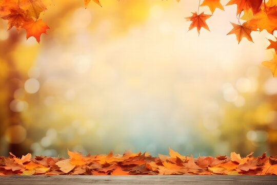 Wooden Table With Orange Leaves And Blurred Autumn Background.