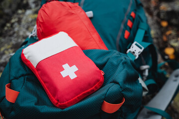 First aid kit close-up, cosmetic bag with medicines. Travel First Aid Kit, Hiking Option