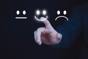 ๊User touch on smile face icon for review and feedback rating, Customer Experience Concept,  Excellent Smiley Face and Rating for a satisfaction survey,  Positive customer feedback testimonial.