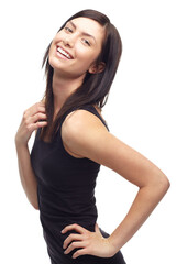 Happy woman, portrait and fashion of attractive model posing in fitness or flirt against a white studio background. Face of young female person or athlete smile posing for healthy body and wellness