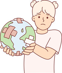 Little girl holding globe with band-aid, worrying about ECO issues and co2 carbon dioxide emissions