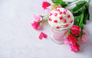 Hot white chocolate cocktail for Valentine's day holidays on a white isolated background