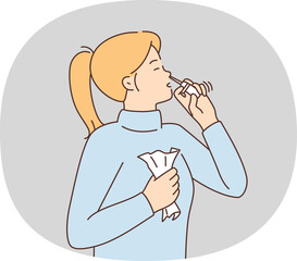 Sick woman use nasal spray