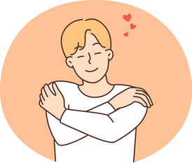Smiling man hug himself show self-love