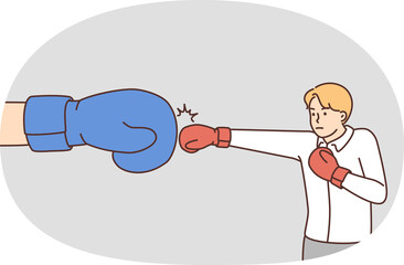 Male employee fight with huge hand