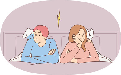 Stubborn couple in bed avoid talking