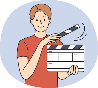 man holding clapperboard, red shirt, film making clip art preview