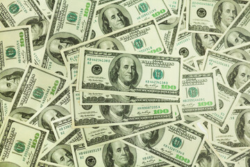 One hundred dollar bills background