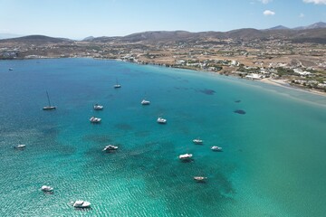 Aerial views from over Kolympethres Beach on the Greek Island of Paros. 