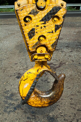 Metal hook of the industrial crane.