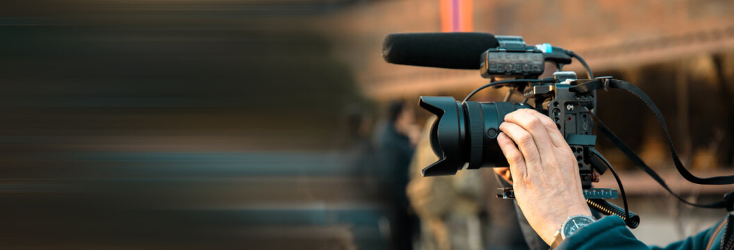 The videographer takes a crowd of people