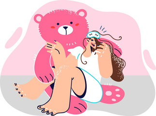 Woman lies on lap of huge teddy bear and laughs rejoicing at cute gift from father or boyfriend - obrazy, fototapety, plakaty