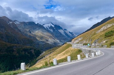 Landscape of a road  on Grossglockner high alpine. Austrian Alps with snowy green mountains