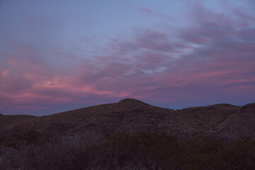 Pink Clouds Reach Across The Empty Desert Of Big Bend
