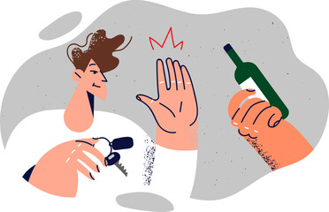 Man driver refuses alcohol and demonstrates stop gesture urging not to drive while intoxicated