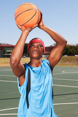 Basketball, player and shoot on outdoor court for fitness challenge or sports train for game, match as athlete. Black man, score point for summer goal dunk or competition winner, cardio or confident