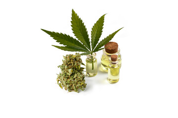 Bottle of cannabis oil, leaf and bud on a white background. isolated - 676921531