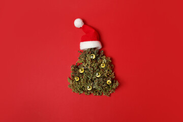 Cannabis bud in the shape of a Christmas tree. Creative Christmas concept